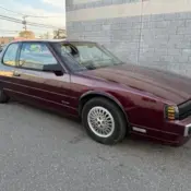 1989 Burgundy Oldsmobile Toronado thumbnail