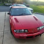 1989 Red Pontiac Grand Prix thumbnail