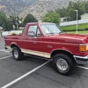 1990 Orange Ford Bronco thumbnail