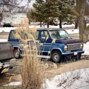 1990 Blue Ford E-150 Econoline Club Wagon thumbnail