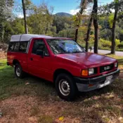 1990 Red Isuzu Conventional thumbnail