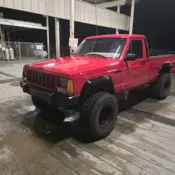 1990 Red Jeep Comanche thumbnail