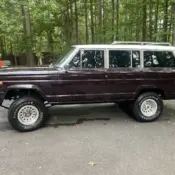 1990 Red Jeep Wagoneer thumbnail