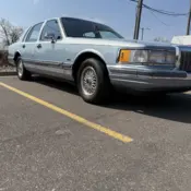 1990 Blue Lincoln Town Car thumbnail