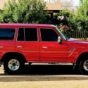 1990 Red Toyota Land Cruiser thumbnail