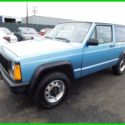 1990 Blue Jeep Cherokee thumbnail