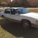 1991 White Cadillac DeVille thumbnail