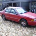 1991 Red Dodge Spirit thumbnail
