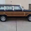 1991 Burgundy Jeep Wagoneer thumbnail