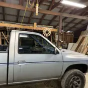 1991 Blue Nissan Truck thumbnail