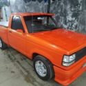 1991 Orange Ford Ranger thumbnail