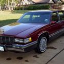 1991 Red Cadillac DeVille thumbnail