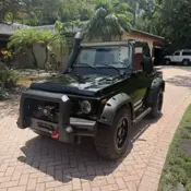 1991 Black Suzuki Samurai thumbnail