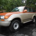 1991 burnt orange/almond Toyota Land Cruiser thumbnail