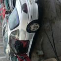 1993 white Pontiac Grand Am thumbnail