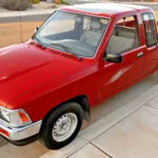 1993 Red Toyota Pickup thumbnail