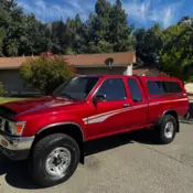 1993 Red Toyota Pickup thumbnail