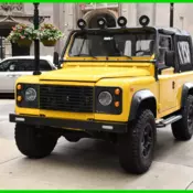 1994 Yellow Land Rover Defender thumbnail