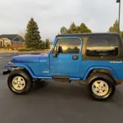 1994 Blue Jeep Wrangler thumbnail