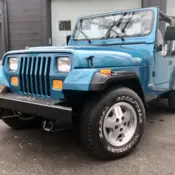 1994 Blue Jeep Wrangler thumbnail