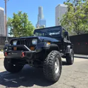 1994 Black Jeep Wrangler / Yj thumbnail