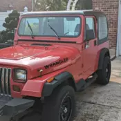 1994 Red Jeep Wrangler thumbnail