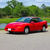 1994 Red Saturn S-Series thumbnail