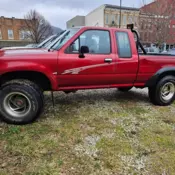1994 Red Toyota Pickup thumbnail