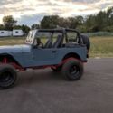 1992 Blue Jeep Wrangler thumbnail