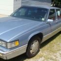 1991 Blue Cadillac DeVille thumbnail