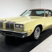 1976 Cream Gold Oldsmobile Cutlass thumbnail