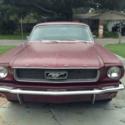 1965 Burgundy Ford Mustang thumbnail