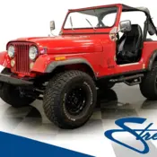 1985 Red Jeep CJ thumbnail