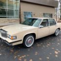 1985 tan Cadillac DeVille thumbnail