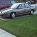 1991 Gold Saturn L-Series thumbnail