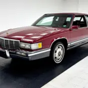 1991 Carmine Red Cadillac DeVille thumbnail