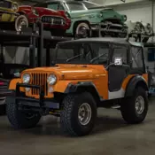 1973 Orange Jeep CJ thumbnail
