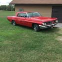 1962 Red Pontiac Grand Prix thumbnail