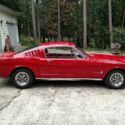 1965 Red Ford Mustang thumbnail