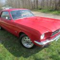 1965 red Ford Mustang thumbnail