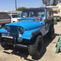 1976 Blue Jeep CJ thumbnail