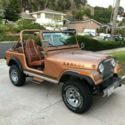 1984 Gold Jeep CJ thumbnail