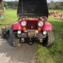 1985 Red Jeep CJ thumbnail