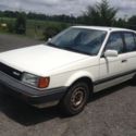 1987 White Mazda 323 thumbnail