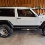 1991 White Jeep Cherokee thumbnail