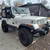 1991 White Jeep Wrangler thumbnail