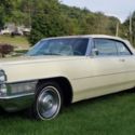 1965 yello Cadillac DeVille thumbnail