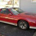 1985 red Chevrolet Camaro thumbnail