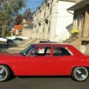 1965 Red Chevrolet Impala thumbnail