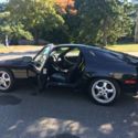 1986 Black Porsche 928 thumbnail